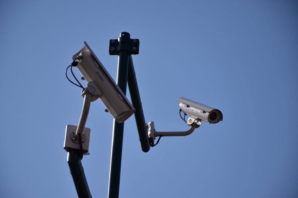 Surveillance cameras blue sky