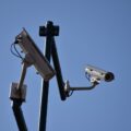 Surveillance cameras blue sky